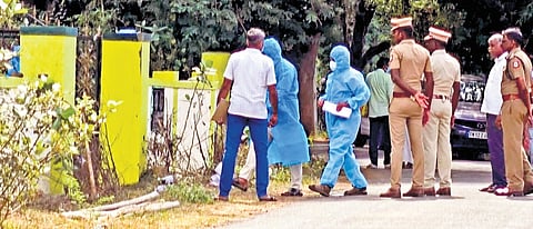 Medical team entering the burial ground in Vengalur