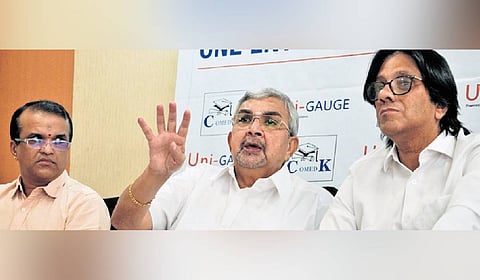 S Kumar, executive secretary of COMEDK, and P Muralidhar, CEO, ERA Foundation, announce the examination schedule in Bengaluru on Thursday.