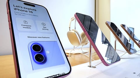 A display of iPhones in an Apple store.