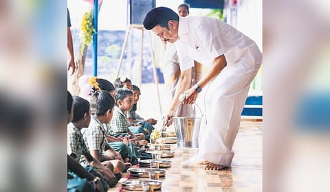Chief Minister MK Stalin serving food to school kids
