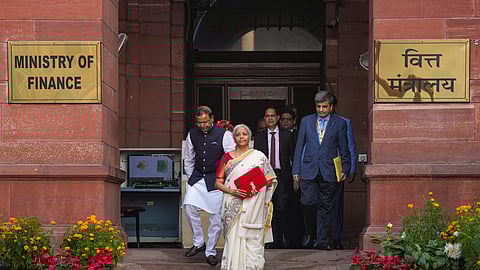 Union Finance Minister Nirmala Sitharaman with Union Minister of State for Finance Pankaj Chaudhary and other officials outside the Finance Ministry ahead of the presentation of the Union Budget 2025-26 in New Delhi, Saturday, Feb. 1, 2025. 