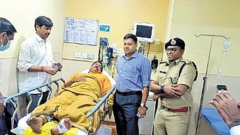 A head constable was injured after a suspected criminal opened fire at a police team who went to apprehend him at a pub.