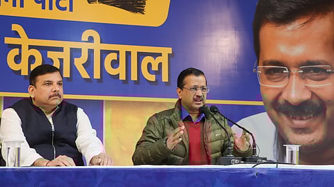 Aam Aadmi Party (AAP) National Convener Arvind Kejriwal addresses a press conference with party leader Sanjay Singh ahead of the Delhi Assembly elections, in New Delhi, Sunday, Feb. 2, 2025.