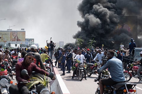 People protest in Kinshasa, Democratic Republic of the Congo Tuesday, Jan. 28, 2025, against the Rwanda-backed M23 rebels' advances into eastern Congos capital Goma.
