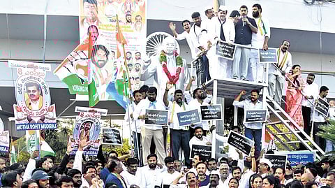 Congress leaders stage a protest at the Ambedkar statue in Hyderabad on Sunday.