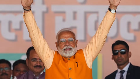  Prime Minister Narendra Modi during a public meeting ahead of the Delhi Assembly election, at RK Puram in New Delhi.