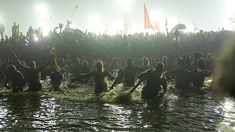 Saints and seers from Akharas taking holy dip in Triveni Sangam on the occasion of Basant Panchami during the Maha Kumbh Mela, in Prayagraj, Monday, Feb. 3, 2025.