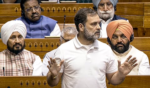 Karnataka Chief Minister Siddaramaiah addresses a press conference with Congress leader Rahul Gandhi at the party headquarters in New Delhi.
