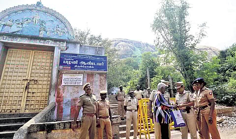 Police deployed in front of the path that leads to the dargah