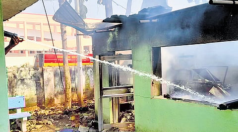 Efforts underway to douse the fire in Pujariguda CHC godown on Tuesday 