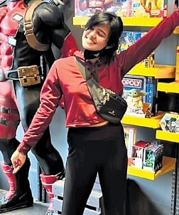 Worn around the waist and chest, fanny packs can be styled in different ways.