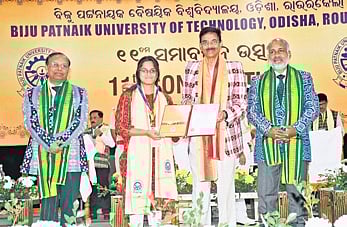 A student is being awarded a certificate at the convocation ceremony.