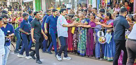 Chief Minister MK Stalin interacting with people during a road-show held at Palayamkottai on Thursday