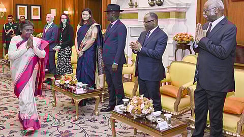 President Droupadi Murmu being greeted by President of the 79th session of the United Nations General Assembly (UNGA) Philemon Yang and others during a meeting at the Rashtrapati Bhavan, in New Delhi. 