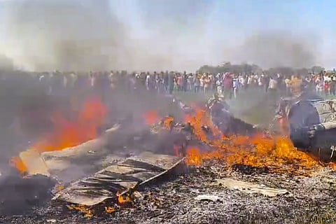 A fighter aircraft of the Indian Air Force (IAF) in flames after it crashed, in Shivpuri, Madhya Pradesh, Thursday, Feb. 6, 2025.