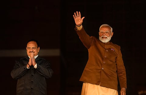 Prime Minister Narendra Modi gestures during celebrations at the BJP HQ after the party won the Delhi Assembly election, in New Delhi, Saturday, Feb. 8, 2025. 