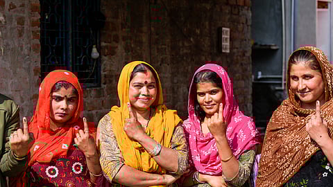 Women in Delhi after casting their vote