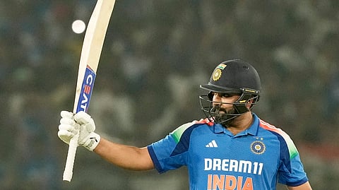 ndian batter Rohit Sharma celebrates his century during 2nd ODI match against England at Barabati stadium in Cuttack, Odisha.
