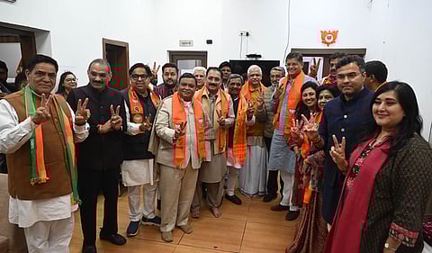 BJP president Virendra Sachdeva along with newly elected BJP MLAs at the party's Delhi office 