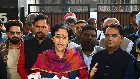 Former Delhi chief minister Atishi with AAP winning candidates addresses the media after a meeting with party convenor Arvind Kejriwal, outside his residence in New Delhi, Sunday, Feb. 9, 2025.