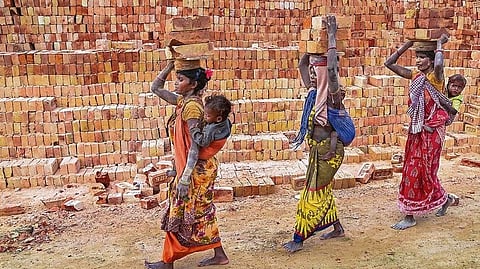 Rural working women have no choice but to work while taking care of their children