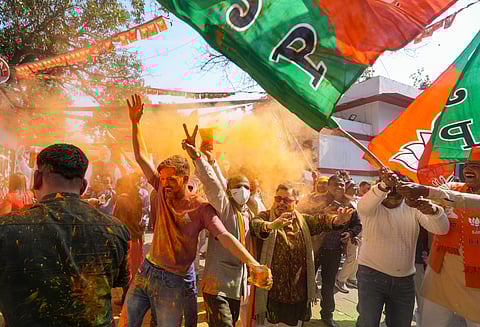 BJP supporters celebrating after Delhi election results were announced.