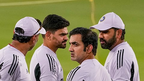Gautam Gambhir and Rohit Sharma with support staff during practice for third ODI against England in Ahmedabad on Tuesday