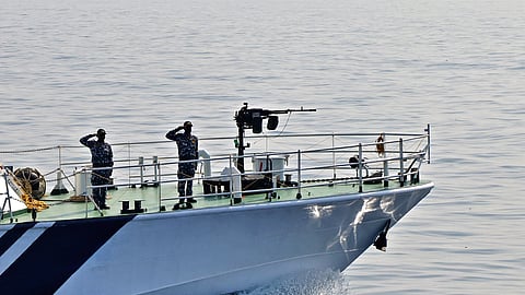 Cost Guard personnel atop a vessel during the mock drill as part of Day at Sea event