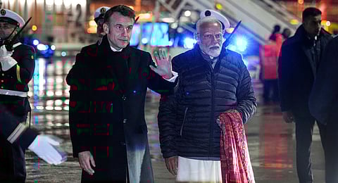 French President Emanuel, left, and Indian's Prime Minister Narendra Modi arrive at Marseille Provence airport in Marignane, southern France, Tuesday Feb. 11, 2025, after the Artificial Intelligence Action Summit in Paris. 