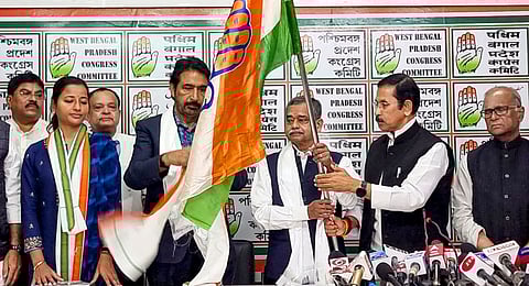 West Bengal Congress President Subhankar Sarkar and party's Incharge of Jharkhand and West Bengal Ghulam Ahmad Mir with former President Pranab Mukherjee's son Abhijit Mukherjee as the latter joins the party, at the party's state headquarters, in Kolkata, Wednesday, Feb. 12, 2025. 