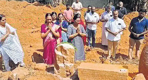Devotees offering prayers at the shivling, unearthed from the grounds of Pala Bishop House during land preparation for agricultural use 