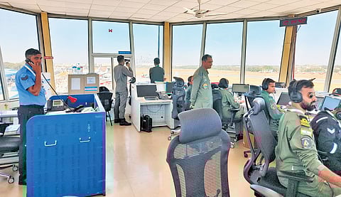 Eyes on the sky, the tarmac, and the screens, as the ATC tower gets busy guiding metal birds on the ground and in the air, at Yelahanka Air Force Station