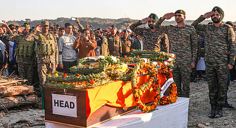 Army personnel pay tribute during the funeral of martyred Naik Mukesh Singh Manhas, who was killed in an IED blast in Akhnoor sector, in Samba district of J&K, Wednesday, Feb. 12, 2025.