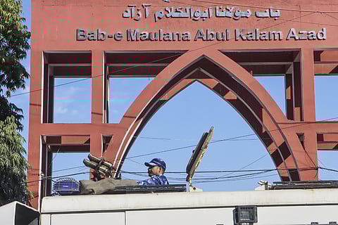 Security personnel deployed outside the Jamia Millia Islamia University in the view of students' protest, in New Delhi, Wednesday, Feb. 13, 2025.