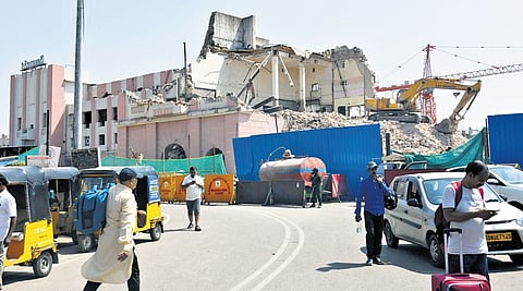 Railway authorities demolish the main terminal building of the Secunderabad Railway Station on Friday 