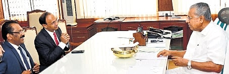  Federal Bank MD & CEO K V S Manian meets CM Pinarayi Vijayan. Bank’s senior vice-president, Shiju K V, is also seen