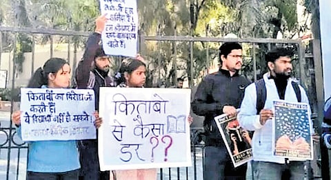 Students protest the cancellation of bookfair in Uttarakhand.  