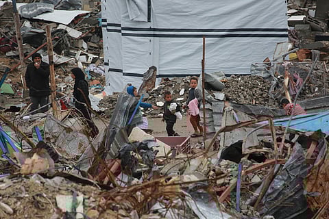 At least eight, including five children, killed in Israeli air strike as Palestinians observe first day of Eid 