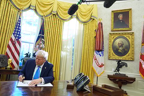 Donald Trump, right, shakes hands with former Vice President Mike Pence before the state funeral for former President Jimmy Carter at Washington National Cathedral in January (Photo | AP)