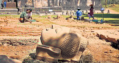 One of the three colossal Buddha heads excavated from a mound on the southern side of Ratnagiri monastery in Jajpur 