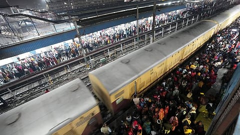 Heavy rush of passengers to catch a train for Mahakumbh, at the New Delhi railway station last year.