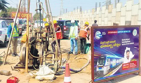Officials carry out survey for Metro corridors in Hyderabad on Sunday.