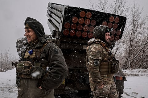 In this photo provided by Ukraine's 24th Mechanised Brigade press service, Ukrainian servicemen prepare to fire an MRLS BM-21 'Grad' towards Russian army positions near Chasiv Yar, Donetsk region, Ukraine, Saturday, Feb. 15, 2025.