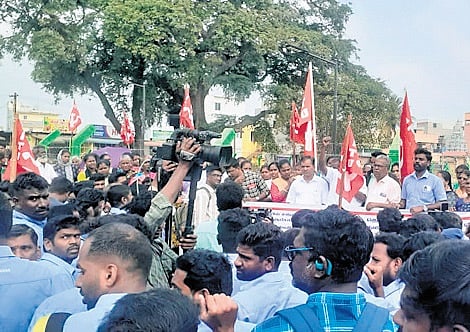 Workers protest with family members at Sunguvarchatram against the suspension of three Samsung India Workers Union members