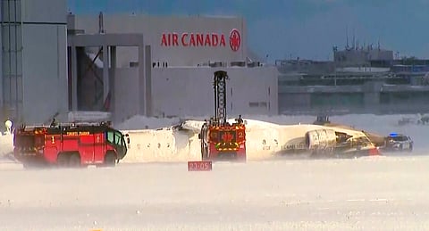 Delta jet flips upside down while landing on snowy Toronto runway; all 80 onboard survive; 18 suffer minor injuries  