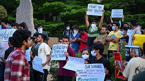 Students in silent protest outside the KIIT University campus demanding justice for the Nepali girl who allegedly died by suicide