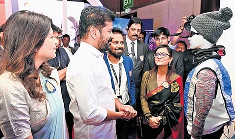 Chief Minister 
A Revanth Reddy interacts with delegates at SHIELD-2025, a conclave on cybersecurity at HICC in Hyderabad on Tuesday