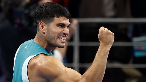 Top-seeded Carlos Alcaraz overcame Croatian veteran Marin Cilic 6-4, 6-4 Monday to reach the round of 16 at the Qatar Open.