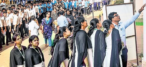 Students queueing up to enter the examination halls at BJB Autonomous College as Plus II exams commence across the state, on Tuesday