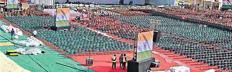 Preparations underway for the oath ceremony at Ramlila Maidan; BJP supporters celebrate outside during the legislature party the party office 